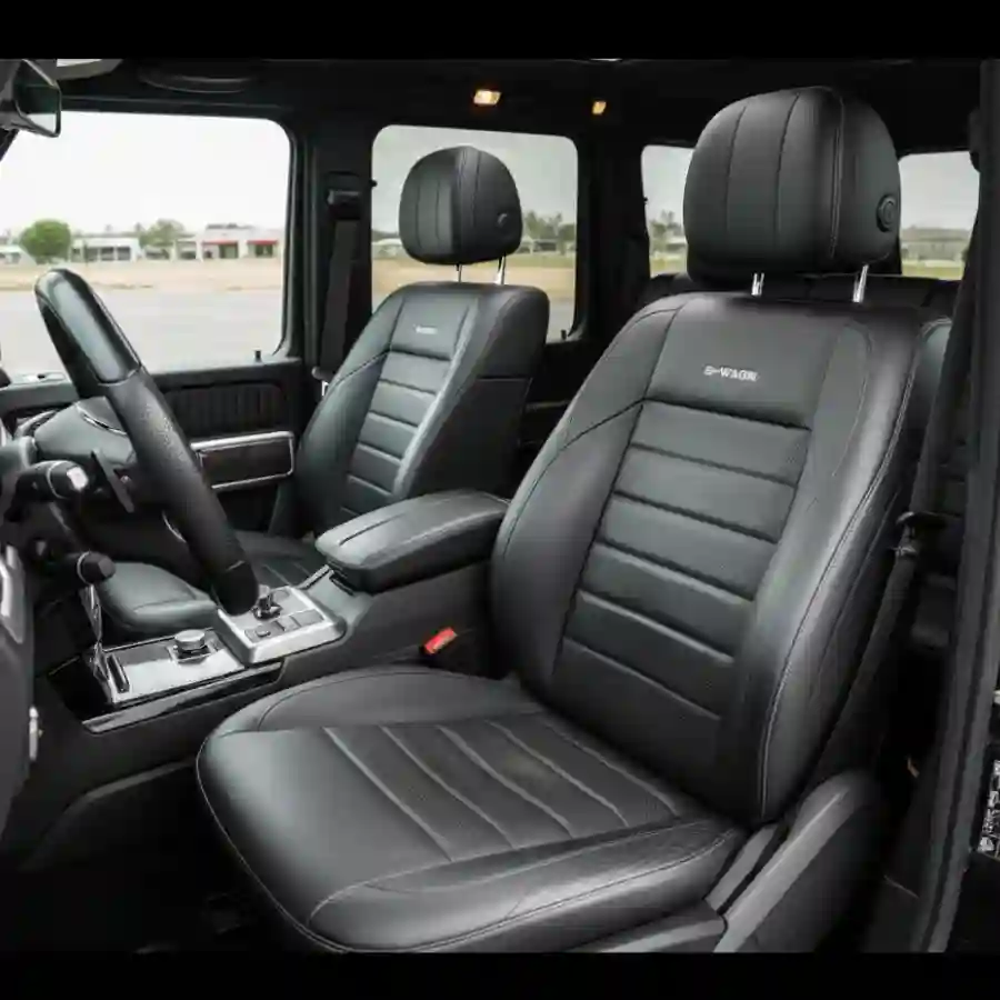 Mercedes G-Wagon G550 interior featuring luxurious black leather seats and a modern dashboard, emphasizing customization options for the limousine configurator by Big Limos.