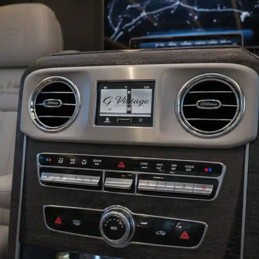 Mercedes G-Wagon G550 interior dashboard featuring climate control buttons, touchscreen display, and luxury finishes, highlighting customization options for luxury vehicle configurations by Big Limos.